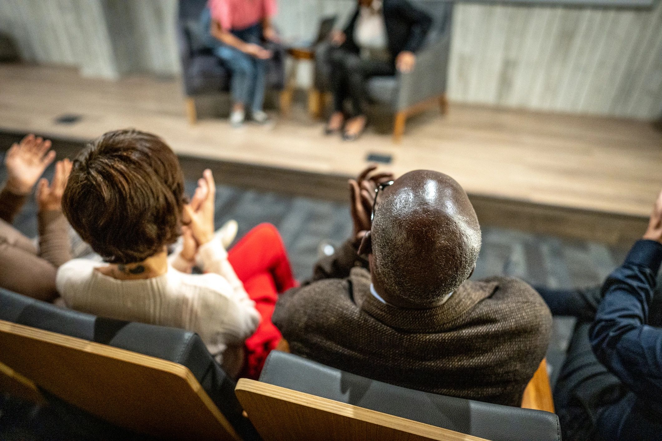 Community members attending a town hall meeting